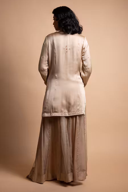 gold handcrafted sharara suit set