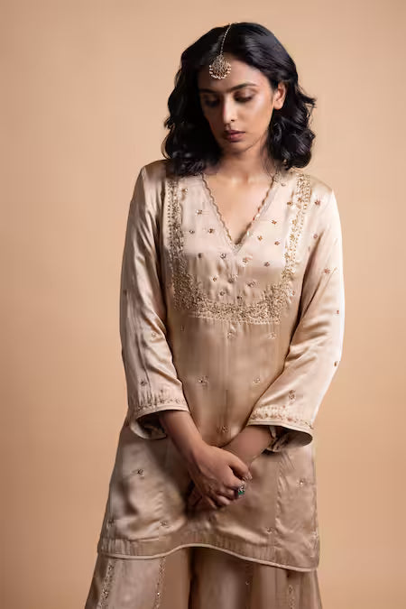 gold handcrafted sharara suit set